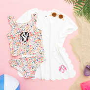 white scalloped cover up flatlay