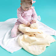 cute baby with duck blanket