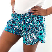 close up of girls pull on shorts