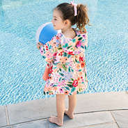 back of monogrammed toddler hooded poncho in coral floral