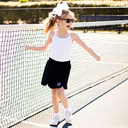monogrammed skort at tennis court