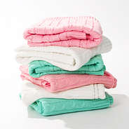 stacked personalized baby blankets