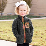 kids monogrammed sherpa jacket zipped up