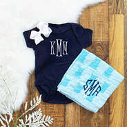 blue bear burp cloth with navy baby onesie