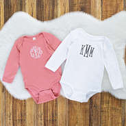 baby long sleeve onesies in white and mauve