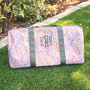 monogrammed youth watercolor duffel bag in grass