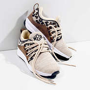 monogrammed youth leopard sneakers in studio