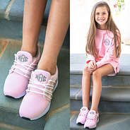 kids pink sneakers with pink shirt and shorts