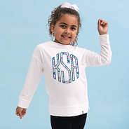 girl wearing colorful leopard monogrammed kids crewneck sweatshirt close up