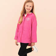 girl wearing hot pink monogrammed lightweight rain jacket