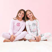girls wearing kids pajamas in pink stripes and pink peony