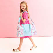 wild confetti weekend bag on shoulder