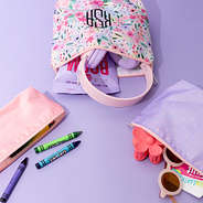 monogrammed kids toiletry bag in coral