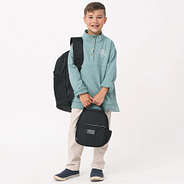 little boy with black monogrammed backpack and lunch box