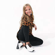 Girl wearing Hickory Crewneck + Sneakers