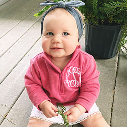 cute baby in monogrammed pullover sweatshirt